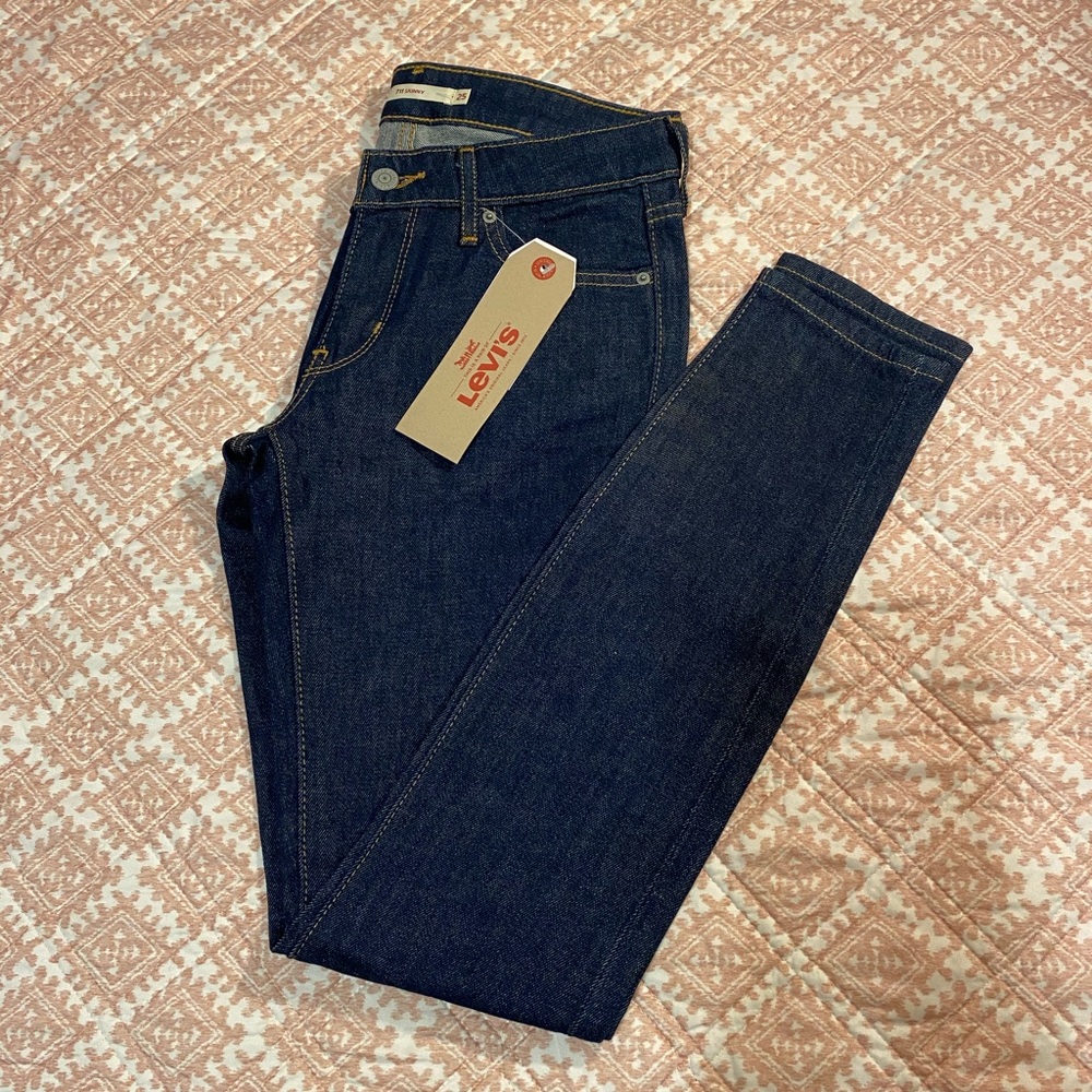Levis Jeans mid rise 711 Skinny size 25x32
